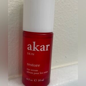 New akar Restore Eye Serum - Red